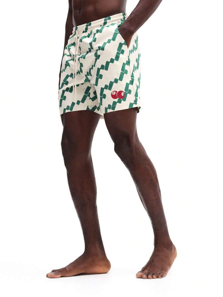 Pantaloncini da spiaggia con motivo geometrico e coulisse in vita