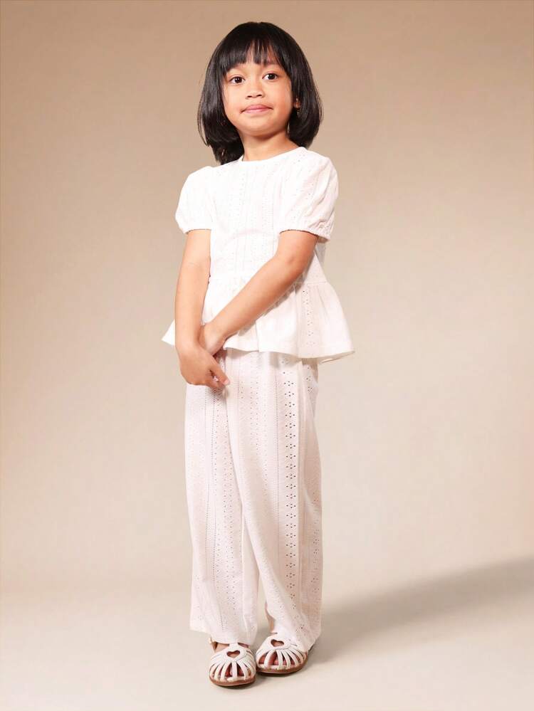 Ensemble haut péplum en dentelle et pantalon palazzo