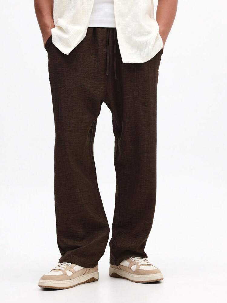 Pantalon large effet lin avec cordon de serrage