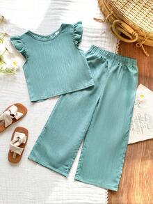 Vintaside Kids Bộ đồ thể thao cho bé gái gồm áo thun ngắn tay chất liệu vải có họa tiết, thiết kế cài cúc phía sau và quần dài kiểu dáng thường ngày. - màu xanh lá - Xem 4