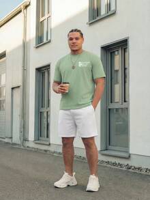 Manfinity EZcore Suitable For Both Business Commute And Casual Wear, Light Green Short Sleeve T-Shirt With "Still Willing To Follow Freedom" Printed Pattern, Paired With White Athletic Shorts, A Fresh, Relaxed, Casual Outfit. Fashionable And Exquisite, Also An Excellent Gift For A Boyfriend. Men's Shorts Set, Plus Size Men's 2 Pieces Set, Travel Suit. - Black - View 2