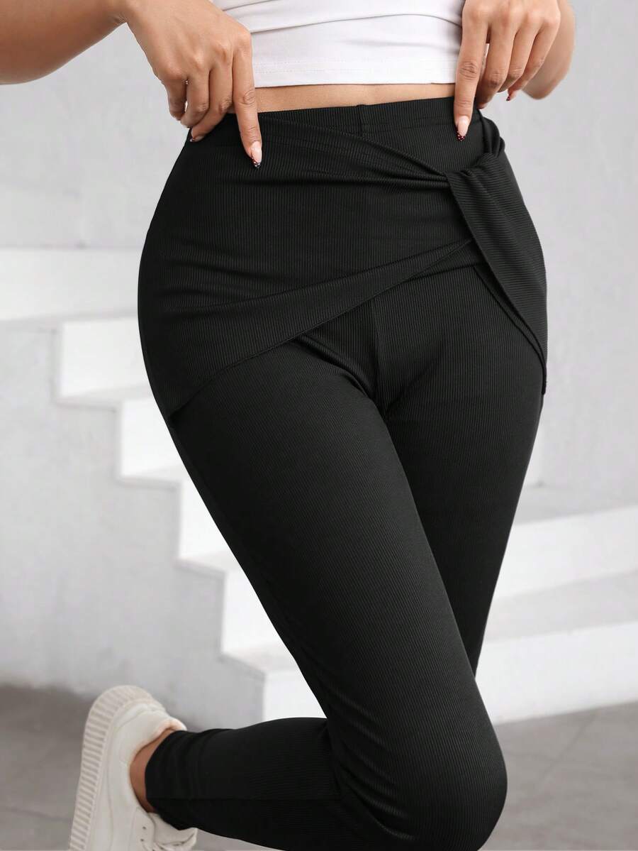 Modelyn Black Elastic Fitted Asymmetrical Hem Leggings With Waist Drawstring, Layered Design Slim Fit Pants For Women - Black - View 1