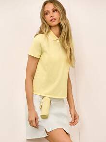 GLOWMODE Áo Polo Piqué mềm mại, thoáng mát, dài đến hông, dáng ôm, thiết kế hai tông màu, logo phía trước, cổ áo phẳng dệt kim, cổ tay áo có khóa kéo ¼, thích hợp cho tennis, golf, pickleball, mặc hàng ngày và thường ngày. - Màu vàng - Xem 1