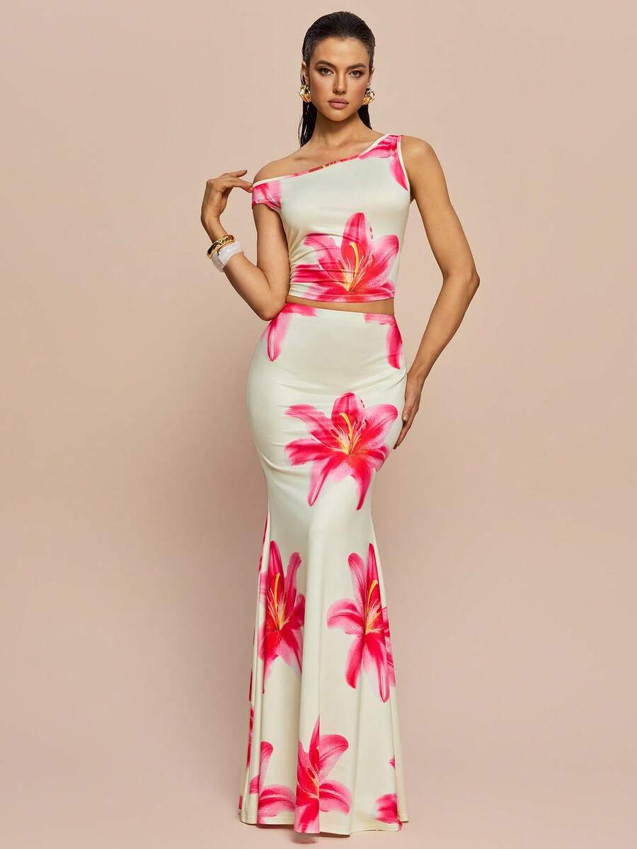 Olia Maree Olia Maree 女士夏季两件套，不对称领口露肩无袖短款上衣搭配高腰美人鱼长裙，花卉数码印花针织面料，弹力舒适，休闲修身，时尚年轻，适合日常穿着、海滩度假等场合。花卉长裙套装，度假装，修身长裙，女士晚宴礼服套装，两件套裙装，花卉连衣裙，长款花卉连衣裙，花园派对连衣裙，夏季花卉连衣裙，芙蓉花连衣裙，花卉婚礼宾客连衣裙，度假晚宴连衣裙，长款夏季连衣裙，女士夏季两件套，女士派对连衣裙，女士春季连衣裙，女士正装 - 彩色 - 查看 1