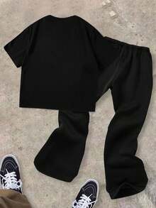 SHEIN Bolty 2025 Y2K 街头风青少年男童两件套 - 超大印花T恤和喇叭裤,朋克涂鸦,返校季,Z世代嘻哈复古运动套装,适合春夏男童嘻哈服饰,青少年男童服装套装,酷炫青少年男童套装,Y2K 男童服装套装 - 黑色 - 查看 3
