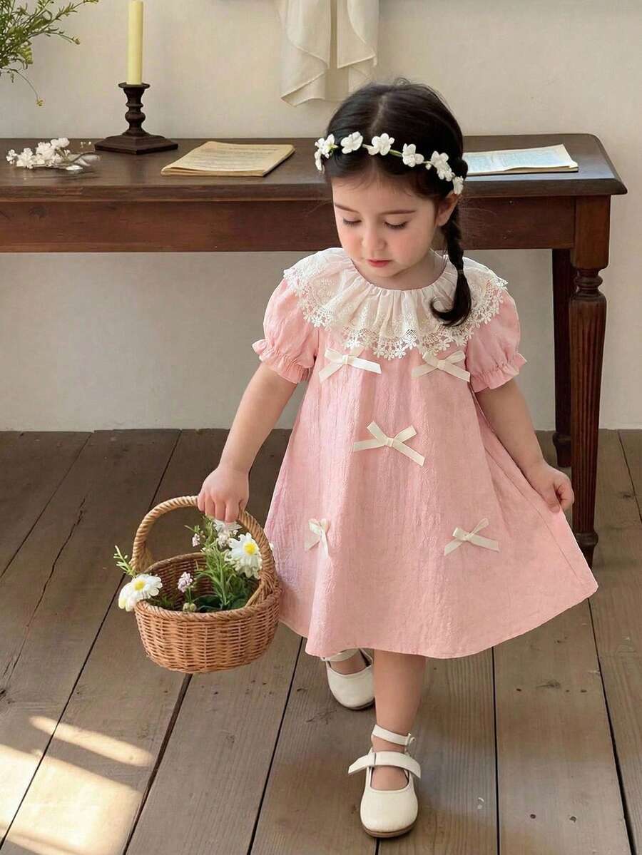 SHEIN Vintaside Kids 1件女婴舒适时尚常规厚度圆领连衣裙,饰有可爱蝴蝶结,百搭基础款泡泡袖柔软连衣裙,适合夏季休闲、户外、旅行、上学和日常穿着。 - 彩色 - 查看 1