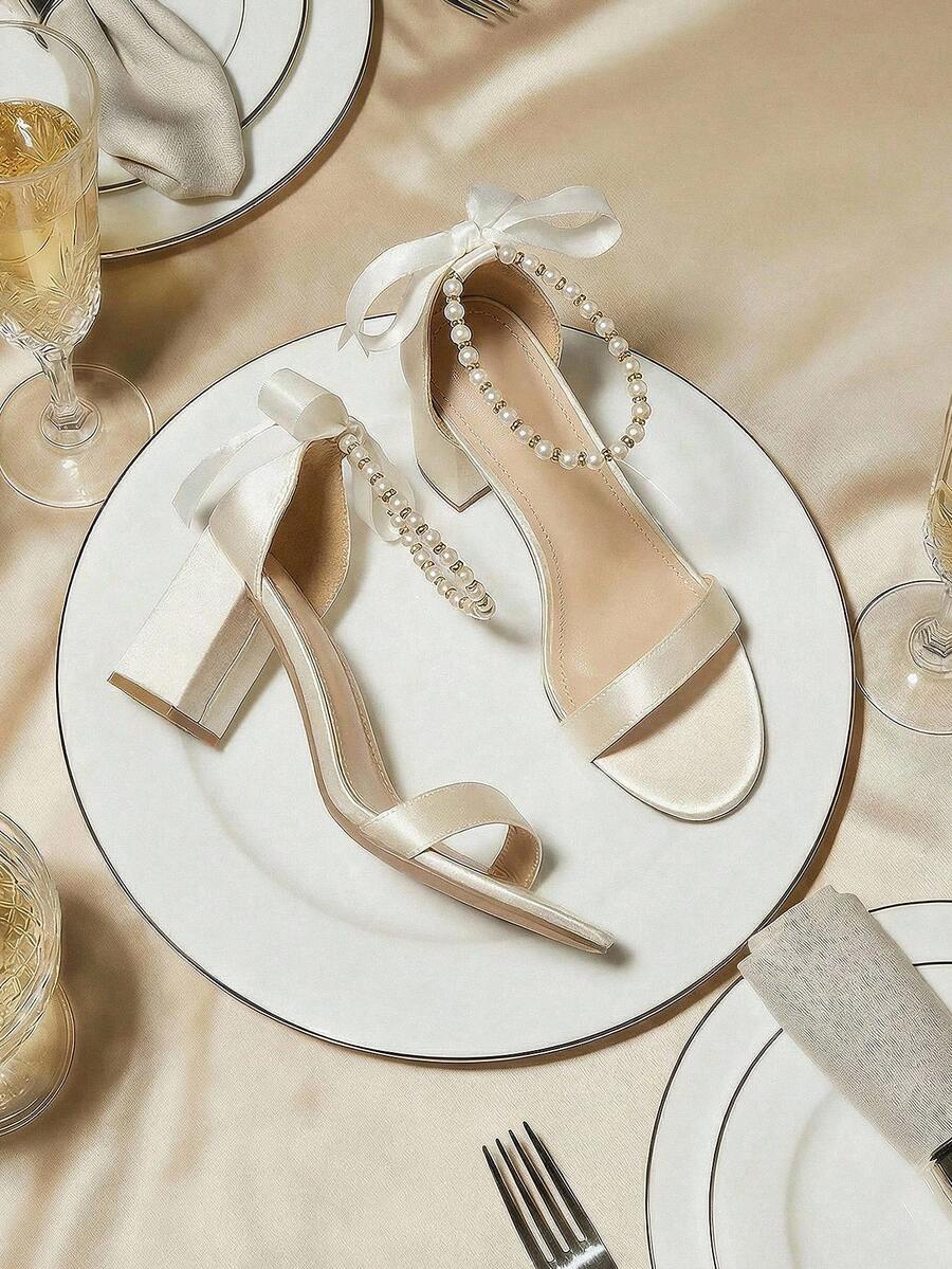 夏季时尚珍珠蝴蝶结婚礼派对鞋，性感圆头软皮粗跟白色凉鞋，优雅简约女士高跟凉鞋 - 杏色 - 查看 1