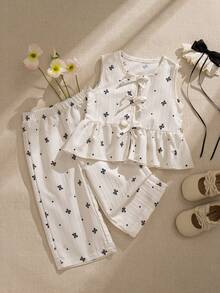 Souflis Souflis 2pcs Baby Girls' Milky White Delicate Black Print Sleeveless Ruffled Collar Shirt With Bow Decor And Elastic Waist Pants Set, Comfortable And Cute For Spring, Summer And Autumn Baby Girls Elegant Outfit Baby Girls Summer Outfit Sleeveless Top And Pants Set - White - View 4