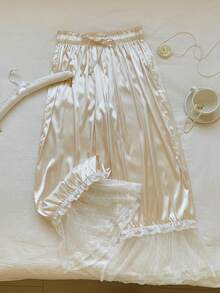 Comfortcana 2026新款春夏时尚女装纯色纸袋腰蕾丝拼接优雅长裤，适合夏季穿着，情人节、海滩度假等场合，展现2000年代风格，美式休闲，适合情人节、狂欢节、居家休闲、海滩度假等各种场合。 - 杏色 - 查看 7