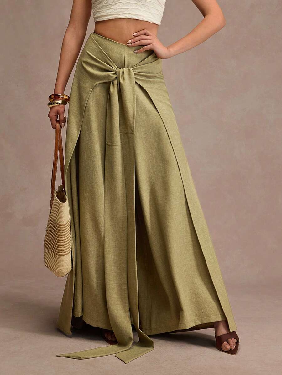 CLARA VERO Aki 高腰裹身长裙裤：宽松飘逸的版型，腰部系带可调节，适合户外活动或时尚日常穿着，采用无弹力亚麻质感涤纶面料，后背隐形拉链，裙摆重叠设计。 - 卡其色 - 查看 1