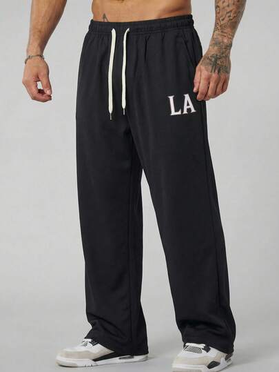 Manfinity Homme Men's Casual Versatile Letter Print Drawstring Waist Pants