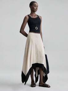 Ontre 2026春夏新款女士亚麻混纺不对称下摆半身裙，亲肤亚麻面料，撞色滚边，现代优雅婚礼宾客装，简约浪漫法式时尚奢华都市休闲商务办公装，低调复古高端都市通勤高品质机场邮轮中东必备单品，四季百搭婚礼系列女士半身裙 - 黑與白 - 查看 3