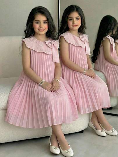 SHEIN Robe plissée sans manches à col fleur 3D avec décoration nœud élégante princesse, couleur abricot, pour jeune fille