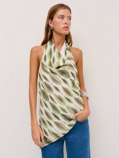 Nöista Floral Chiffon Halter Top With Sleeveless Design, Bias-Cut Hem, And Soft Drape. Lightweight And Breathable, Perfect For Spring, Summer, Easter Outfits, Beach Days, Parties, And Bohemian Vacation Looks.