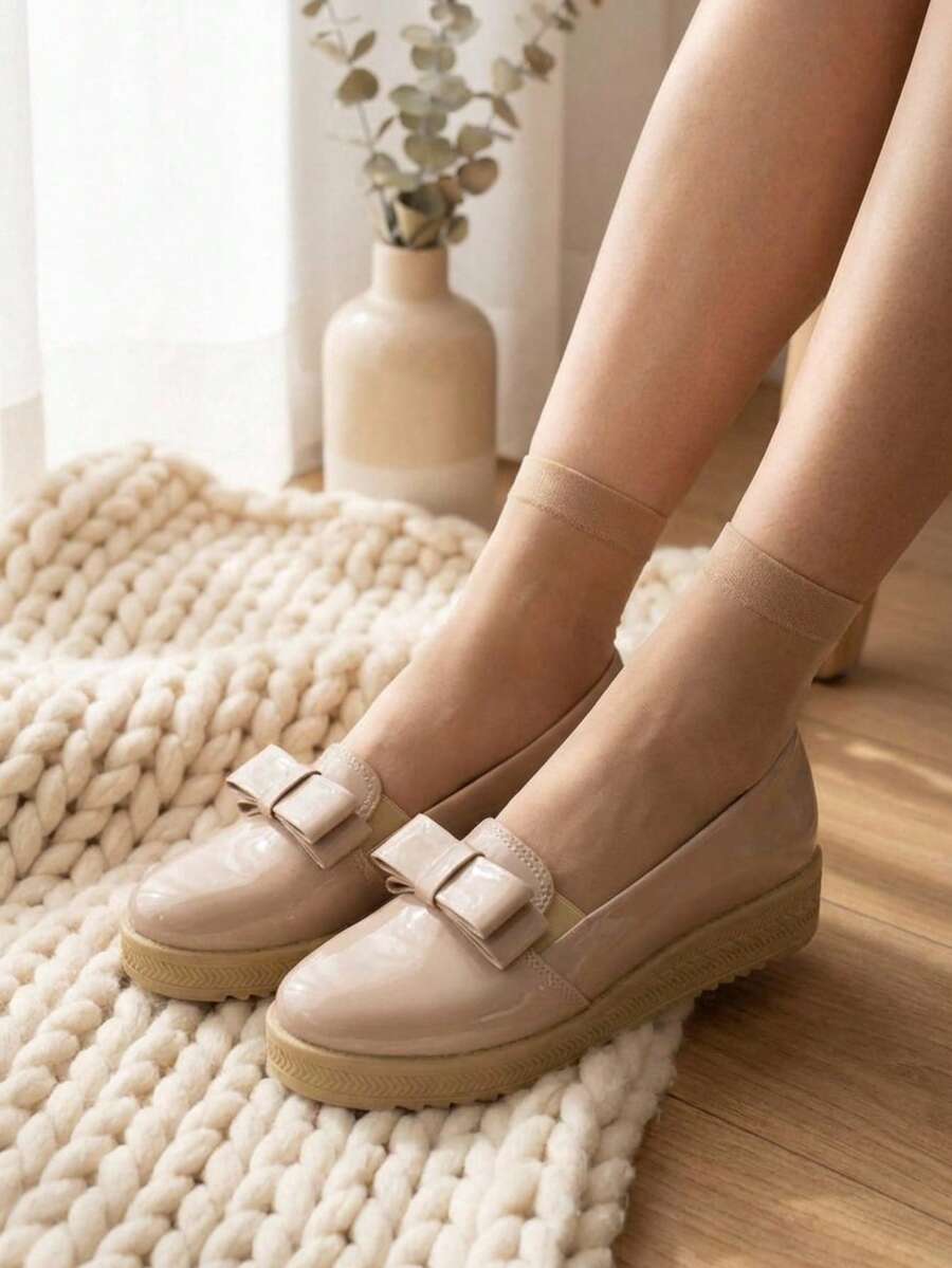 Mocasín de charol en color champagne con lazo decorativo y plataforma - Champán - Ver 1