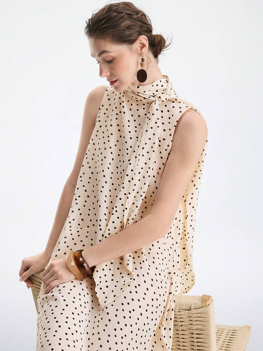 Aalyst Đầm nữ dáng suông không tay, cổ cao, thắt nơ, chấm bi lãng mạn, dài đến đầu gối, kiểu Pháp cổ điển thanh lịch, thích hợp cho công sở, đi làm, kinh doanh, thường ngày, nghỉ lễ, tiệc trà chiều, dạo phố, đơn giản và đa năng, mẫu mới Xuân/Hè. - Màu be - Xem 1