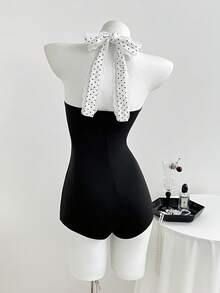 Elamini Bộ áo liền quần cổ yếm chấm bi trang trí nơ dành cho nữ - màu đen - Xem 2