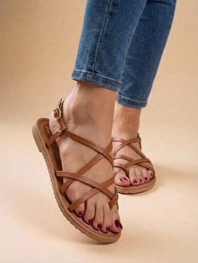 Sandalias planas de moda de playa para mujer, estilo gladiador con tiras cruzadas, color tan, para playa y verano. Sandalias casuales de playa con hebilla en el tobillo en color negro, diseño básico con tiras ideales para el uso diario