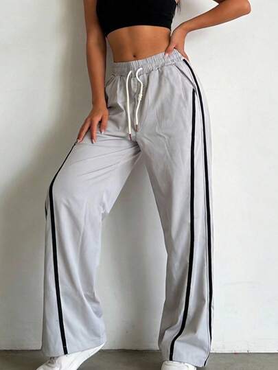 Pants acampanado para mujer deportivo, tela fresca y ligera, con franjas laterales y cintura ajustable, estilo casual deportivo