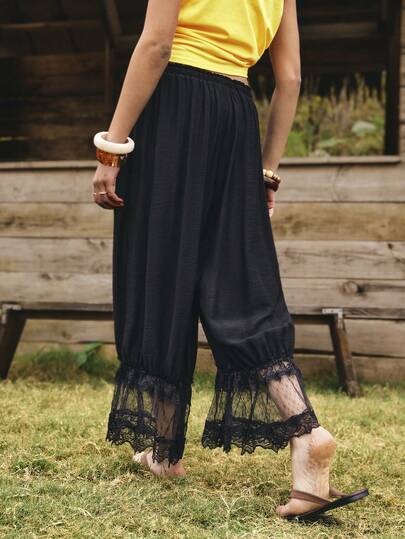 Medorelle RUN HIK Women's Solid Color Elastic Waist Drawstring Pants With Lace Hem, Loose Casual Outdoor Harem Capri Pants, Spring/Summer Boho Pants For Women Wide Leg Capri Pants Wide Leg Summer Pants Tassel Pants Women's Black Drawstring Pants With Elastic Waist And Delicate Lace Trim Detail Casual Wide Leg Trousers
Casual Women's Black Wide Leg Culottes With Elastic High Waist And Chic Lace Hem Detail For Everyday Comfort
Stylish Black Cropped Harem Pants For Women Featuring An Elasticated Waistband And Elegant Lace Accents For Relaxed Wear