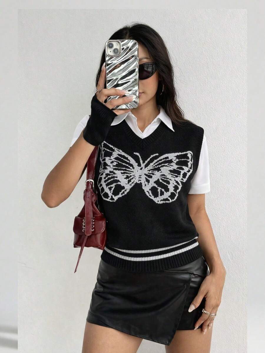 EURMUSE Chaleco de punto de cuello en V negro con intarsia de mariposa blanca - Suéter sin mangas con gráfico para capas - Blanco - Ver 1