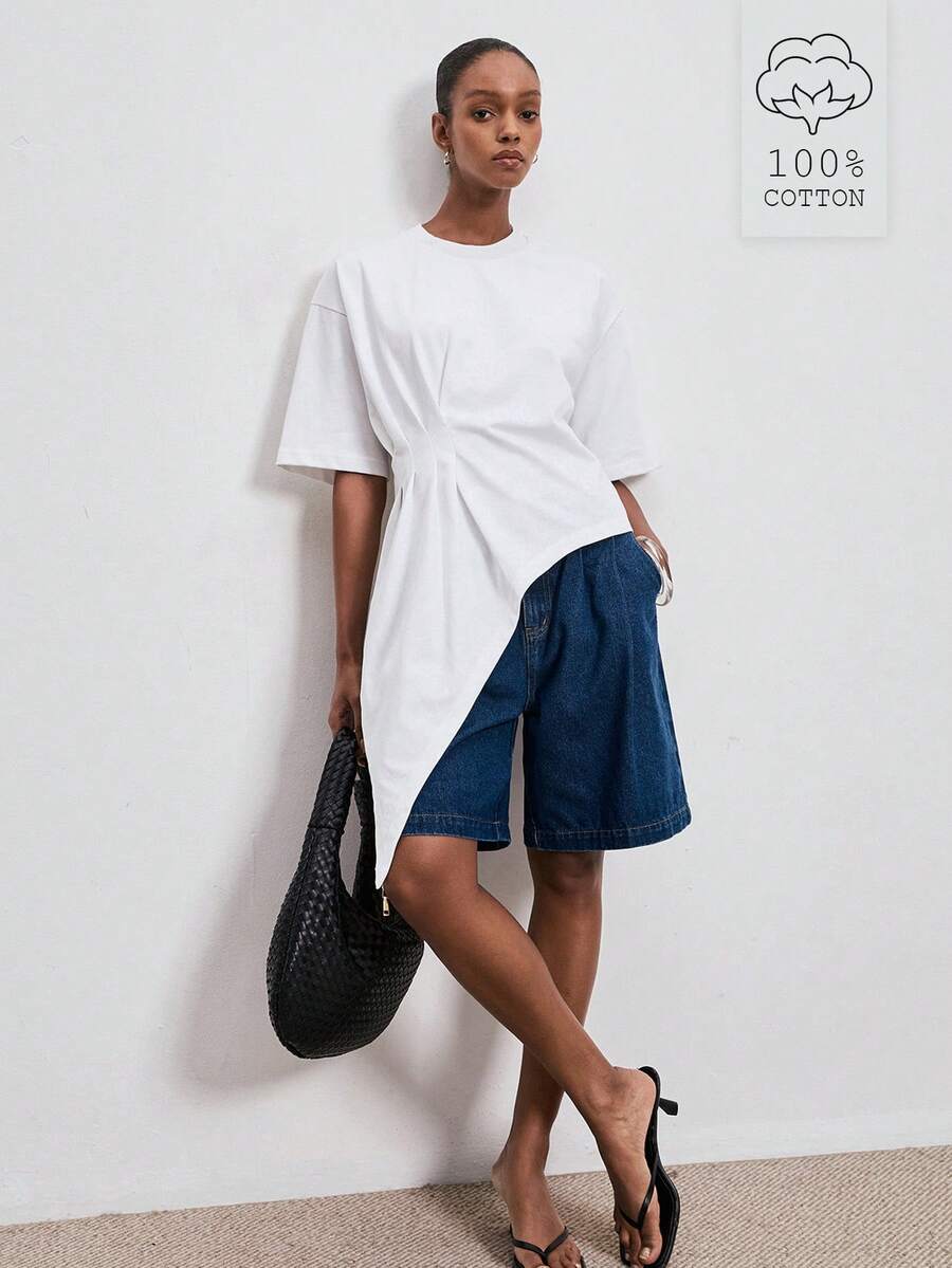 ATUI Studio T-shirt à manches courtes asymétrique blanc minimaliste, silhouette ample avec design fendu confortable. Top casual adapté pour les déplacements quotidiens, les vacances et les sorties - Blanc - Voir 1