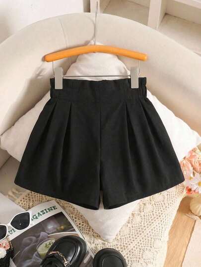 SHEIN Pantalones cortos negros con volantes de unicolor para niña, pantalones cortos tejidos elegantes y de moda, estilo universitario, excelentes para uso casual, diario y escolar en primavera y verano, a juego con mamá, hija y hermanas.
