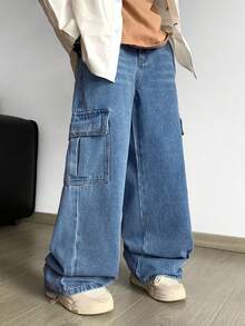 SHEIN بنطلون جينز بطراز كاجوال عصري للمراهقين، بتفاصيل جيوب وقصاصات، بتصميم فضفاض مريح وبسيط، مناسب للارتداء اليومي والربيع إلى الصيف، وحفلات الموسيقى والملابس الشارعية - الأزرق - مشاهدة 3