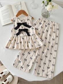 SHEIN LMoss Kids 女童蝴蝶结印花碎花无袖上衣和宽松休闲裤套装两件套 女童碎花套装 女童两件套碎花套装 女童半身裙套装 碎花半身裙套装 女童碎花半身裙套装 蝴蝶结上衣套装 女童套装 女童服装套装 女童半身裙套装 碎花半身裙套装两件套 幼儿 - 杏色 - 查看 3
