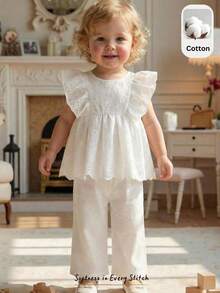 Cozy Pixies Set de 2 piezas de top sin mangas con estampado floral ditsy y pantalones casuales sueltos para niña bebé. Conjunto de 2 piezas de ropa para niñas con estampado floral. Conjunto de falda y top con lazo para niña bebé en estilo vintage. Conjunto de falda con estampado floral y top con lazo para niña bebé. Conjunto de 2 piezas de top con lazo y falda floral para niña. Conjunto coordinado de niña. Conjunto de falda y ropa para niña bebé. - Multicolor - Ver 2