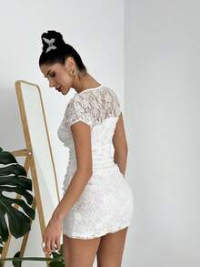 Firerie 女士优雅蕾丝透视修身迷你连衣裙，适合通勤、日常、假日、派对、生日、音乐节、度假、春夏等多种场合。 - 白色 - 查看 6