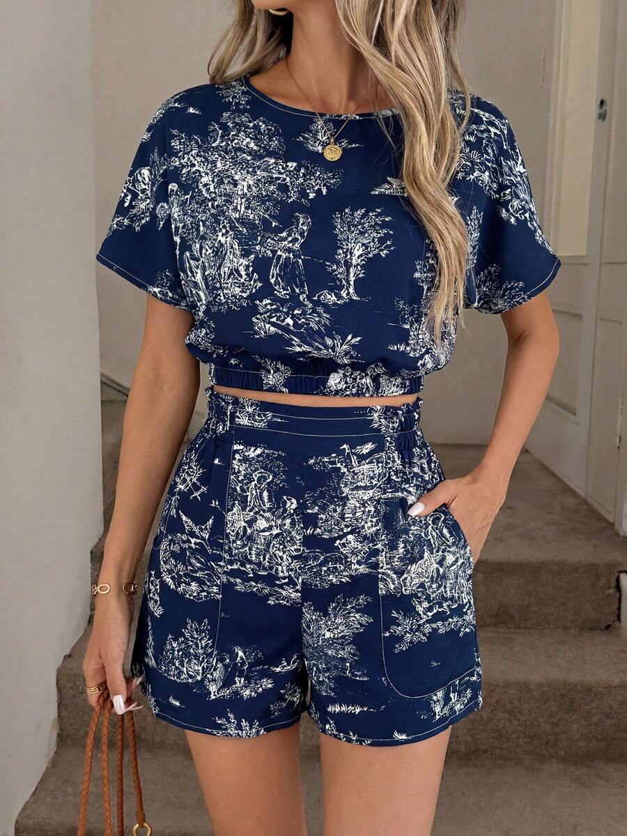 Easowa 复古印花圆领衬衫，下摆褶皱，腰部带褶边口袋，搭配短裤，休闲优雅两件套，适合春夏穿着。女士两件套夏季服装，两件套短裤套装，女士度假服装，女士两件套休闲两件套，女士短裤套装。 - 藏蓝色 - 查看 1