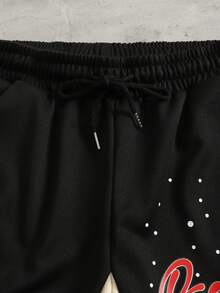 ROMWE MEN Street Life Pantalones cortos casuales y versátiles para uso diario con cordón en la cintura y estampado de letras y ojos para hombres - Negro - Ver 4