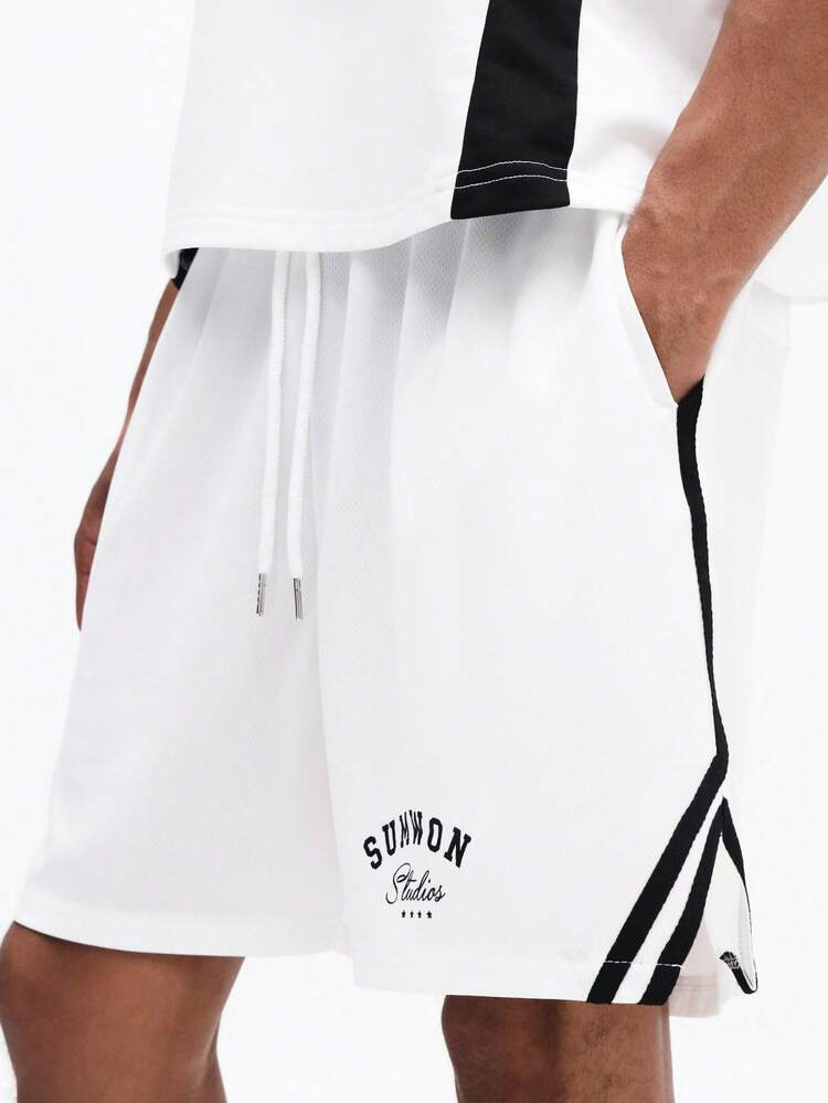 Short blanc à bandes latérales noires