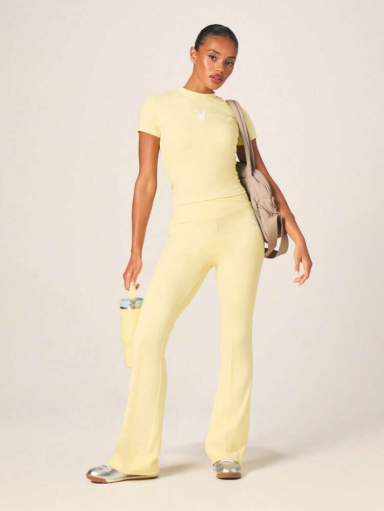 Missguided x Playboy High Rise Cross Over Waist Flared Leggings With White Bunny Logo For Activewear