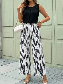 SHEIN Clasi Bộ đồ nữ thanh lịch gồm áo sơ mi xếp ly màu trơn và quần ống rộng in họa tiết cây cỏ, set 2 món mùa hè cho nữ, trang phục mùa hè cho nữ, bộ đồ phối váy và áo mùa hè cho nữ, bộ quần áo nữ. - màu đen - Xem 6