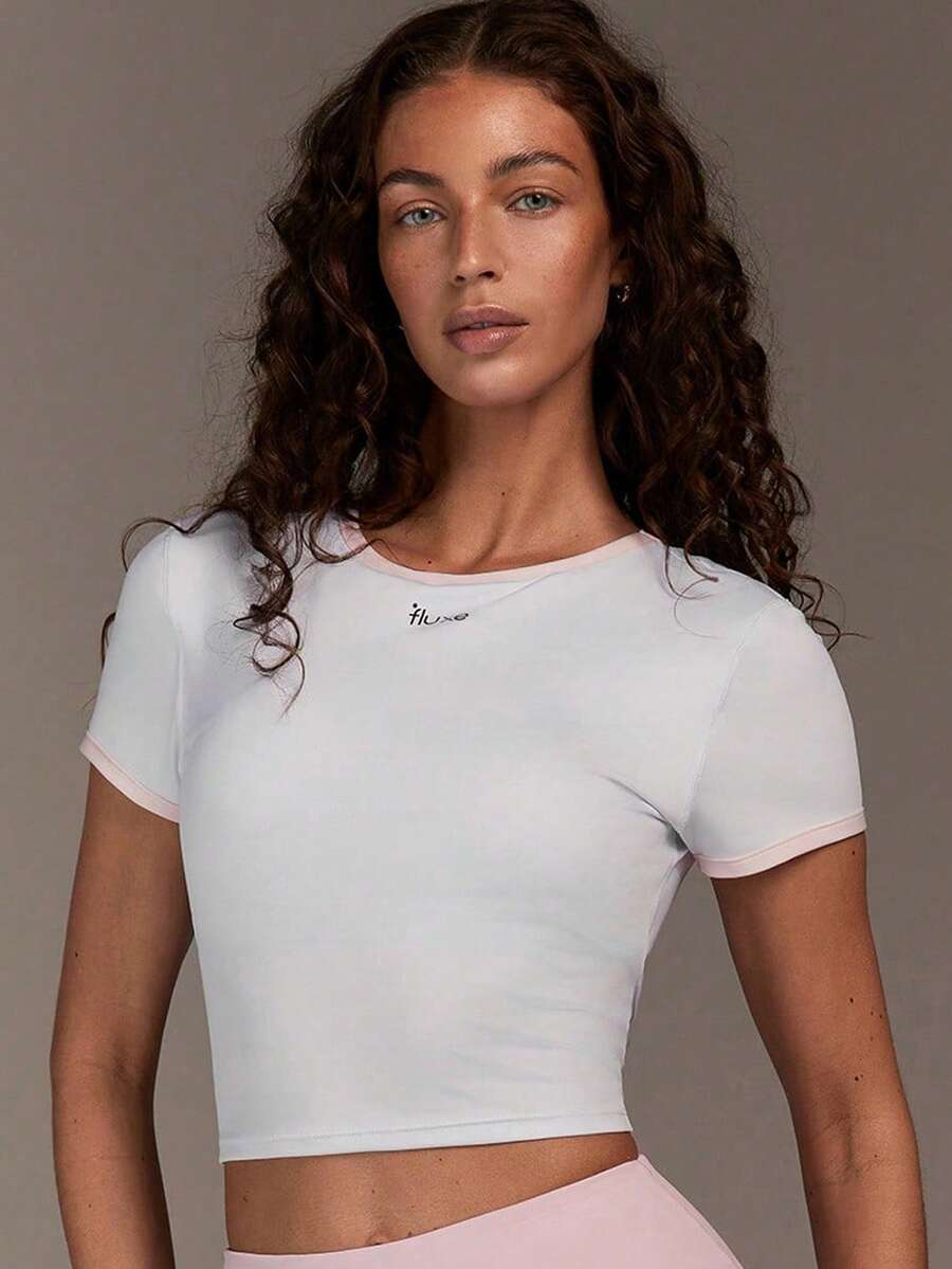 Menodora SHEIN Sport Áo thun thể thao nữ tay ngắn cổ tròn in chữ, dáng lửng - trắng - Xem 1