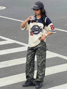 Áo thun croptop cổ chữ V màu xanh lá cây cho nữ tuổi teen, áo thun tay ngắn dáng rộng phối màu tương phản, thích hợp cho mùa xuân/hè dạo phố, phối đồ hàng ngày, thể thao, mua sắm, đi học, nghỉ lễ, phong cách học sinh, lễ Phục sinh, lễ hội âm nhạc, lễ tốt nghiệp, họp mặt gia đình. - Nhiều màu - Xem 3