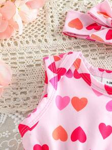SHEIN Bộ áo liền quần kiểu dáng thường ngày cho bé gái, in hình trái tim và có bèo nhún. - Màu Hồng  Dưa hấu - Xem 6