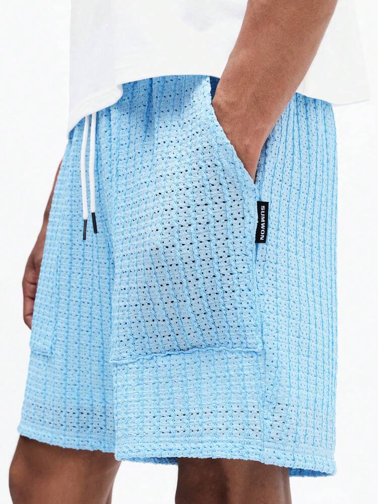 Costume da bagno azzurro testurizzato con coulisse