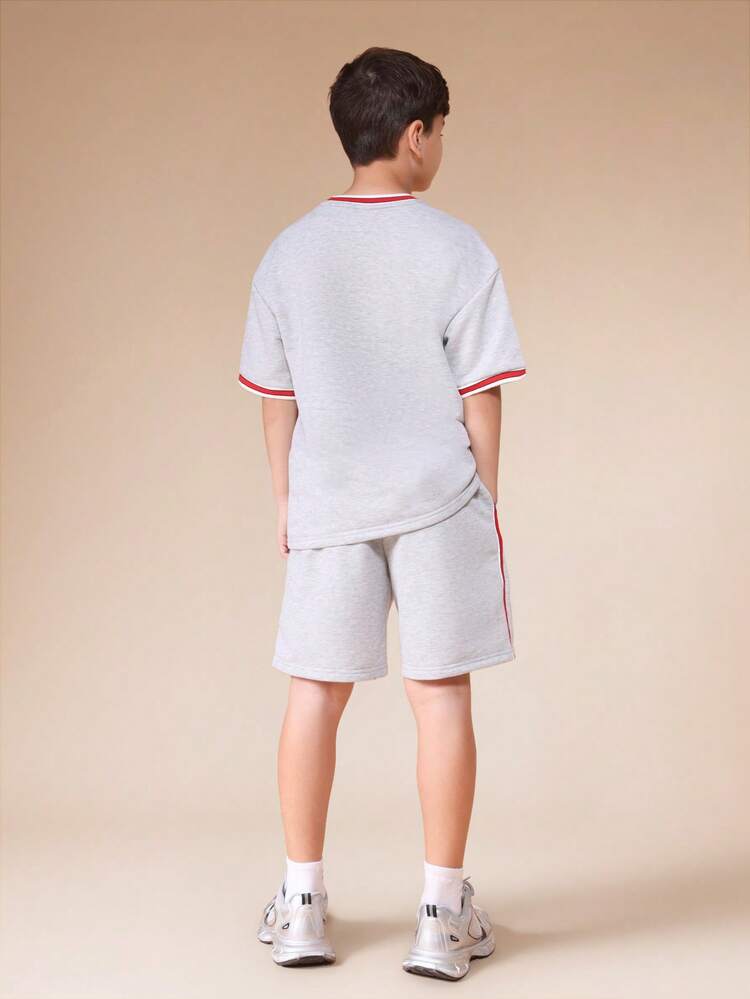Boys Grey Heather Short Sleeve T Shirt And Matching Shorts Co Ord Set With Red White Contrast Ribbed Trim Details