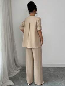 Modelyn Bộ đồ nữ 2 món: Áo cổ chữ V tay xắn và quần ống rộng túi xéo. - Màu Khaki - Xem 2