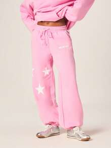 Missguided x Playboy Quần jogger nữ màu hồng in hình ngôi sao, ống rộng, có logo hình thỏ và họa tiết ngôi sao trắng, cạp chun co giãn và dây rút. - Hồng - Xem 1