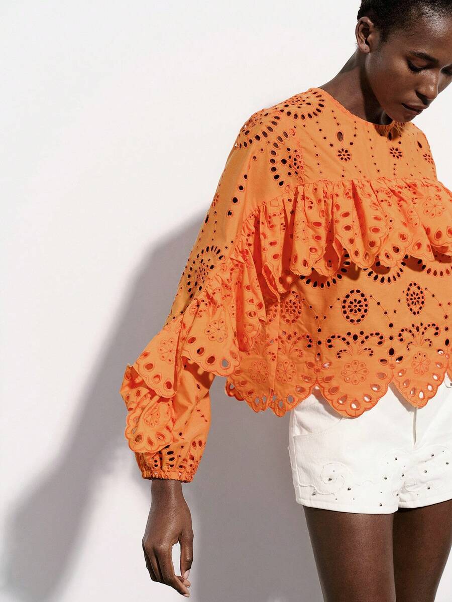 Aveloria Modichic Bright Orange Hollow Embroidered Blouse, Laser Cut Craftsmanship, Vibrant Orange Tone, Bohemian Style, Round Neck Layered Ruffle Trim, Long Sleeve With Elastic Cuffs, 3D Floral Embroidery Elements, Sheer Lightweight Fabric, Fitted Cropped Silhouette, Suitable For Spring/Summer Outdoor Music Festivals, Vacations, Art Exhibitions And Fashion Parties, Highlighting Lively And Unique Personalized, With Visual Impact And Comfort - Orange - View 1