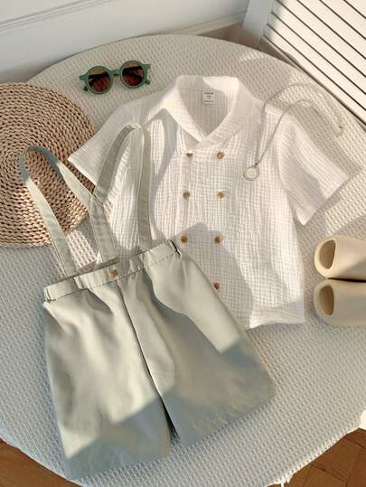 SHEIN Bộ 2 món cho bé trai, kiểu dáng thường ngày, năng động, màu trắng trơn, chất liệu mềm mại, cổ tròn, tay ngắn và quần short kaki viền tương phản, thoải mái cho mùa xuân/hè, đi học, du lịch, nghỉ lễ.