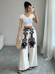 SHEIN Elenzya Pantalones anchos estampados para mujer, elegantes, casuales para vacaciones, viajes, moda, citas, estilo francés retro, versátiles para primavera y verano, con estampado en color negro sobre base color albaricoque, nuevos pantalones anchos - Multicolor - Ver 7