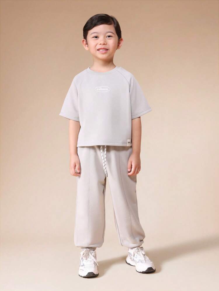 Ensemble sweat-shirt et jogging gris