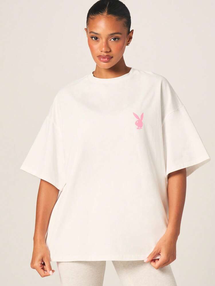 Missguided x Playboy T-shirt graphique rose et blanc surdimensionné pour femmes avec col rond et manches courtes