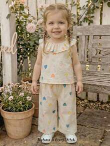 Cozy Pixies Conjunto de 2 piezas de top sin mangas con cuello redondo y pantalones de cintura elástica con estampado de corazón para bebé niña - Multicolor - Ver 2