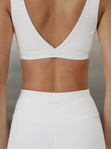 Aralina Bộ đồ thể thao năng động 2 mảnh dành cho nữ: Áo croptop và quần short chéo phía trước, thích hợp cho tập gym và tập luyện. - trắng - Xem 8